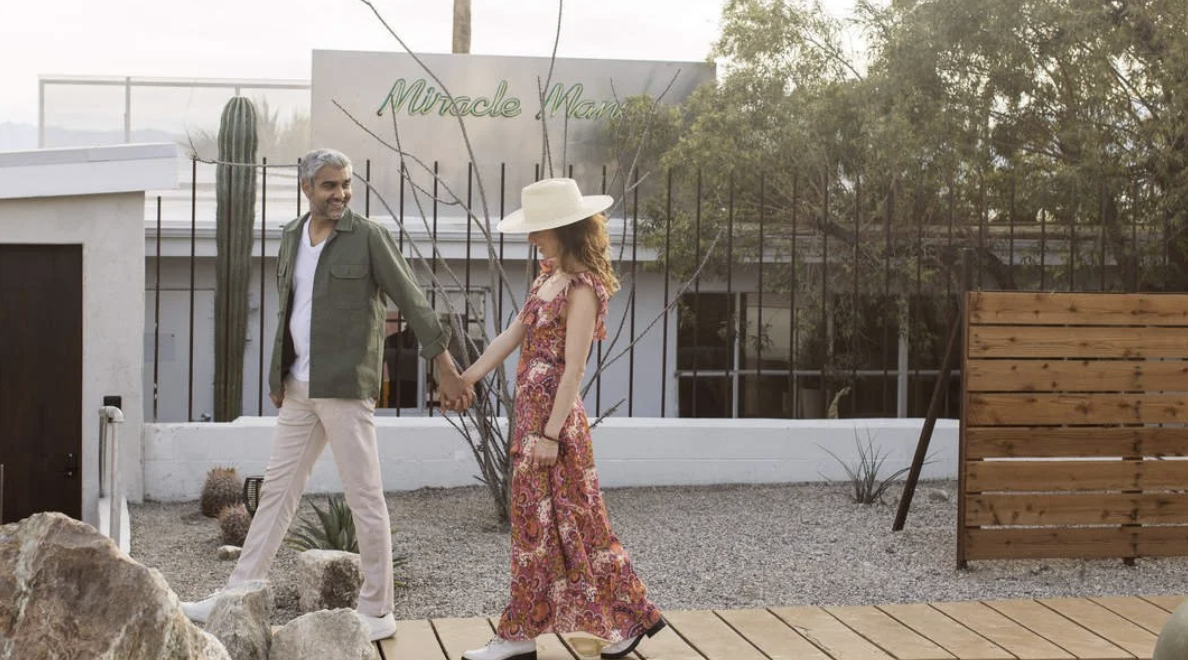 Kelsey and Apurva Patel walking at Miracle Manor Boutique Hotel